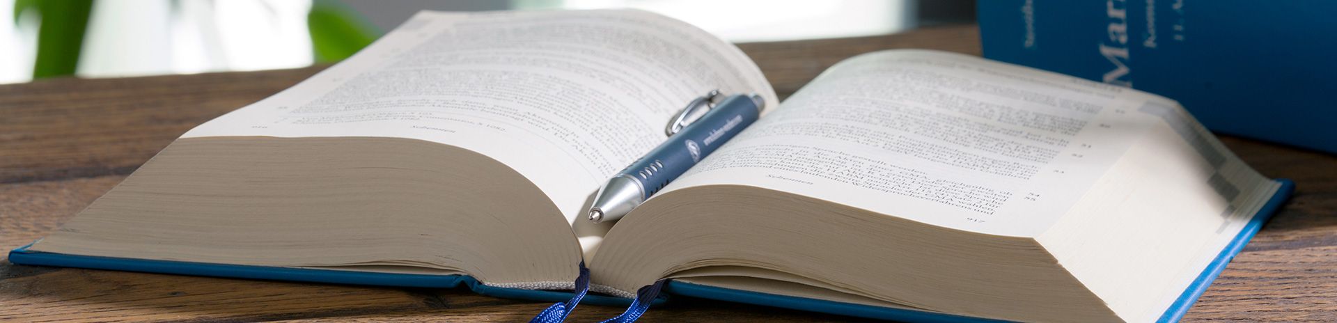 a opened book laying on a table